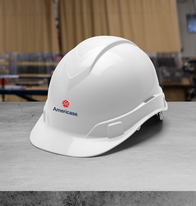 Americase Logo on a white hardhat.