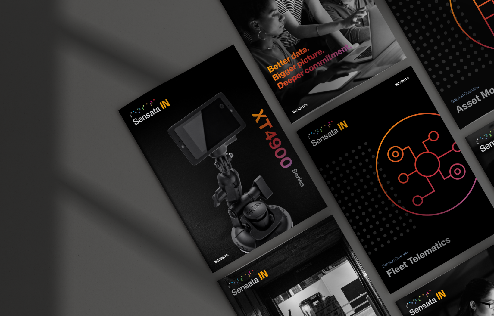 A selection of brochures displaying Sensata IN branding. Prominent brochure labeled XT4900 Series showcases a robotic device. Nearby texts include Better data. Bigger picture. Deeper commitment. Other brochures mention various tech themes.