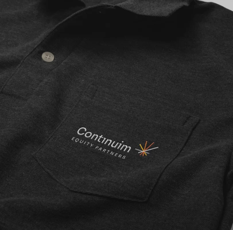 Closeup of the Continuim Equity Partners Logo on a Continuim tshirt.